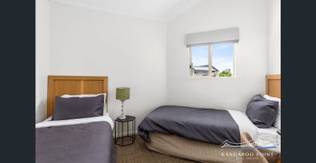 Fully Furnished Loft Style Three Bedroom, Two Bathroom Unit with Pool - Photo 5