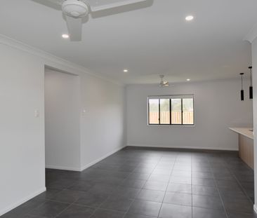 MODERN FOUR BEDROOM HOME IN THE HEART OF RIVERSTONE RISE - Photo 3
