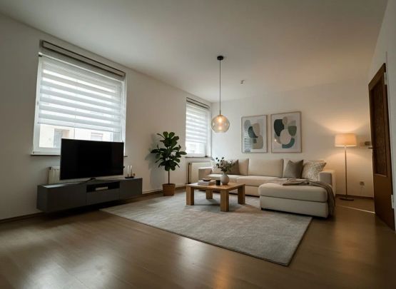 Charmante & gepflegte Erdgeschosswohnung mit Garten zur Miete - Photo 1