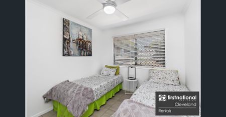 Modern Lowset Family Home with Side Access + Large Shed - Photo 4