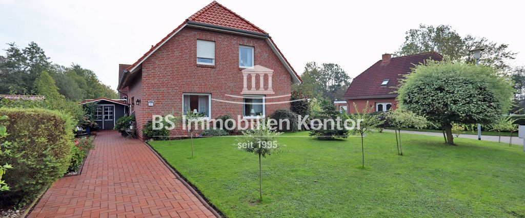 Gepflegtes Einfamilienhaus mit Terrasse, Carport und Terrasse in ruhiger Lage! - Photo 1