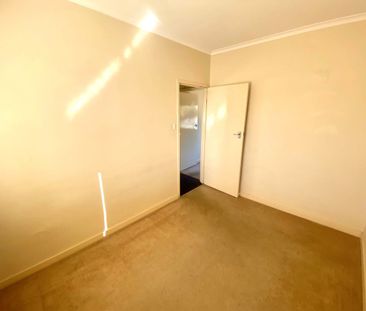 UPPER LEVEL UNIT IN A WONDERFUL LOCATION - Photo 4