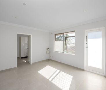 Modern Unit in a Highly Sought After Location - Photo 1