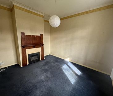 Centrally located three-bedroom home - Photo 2