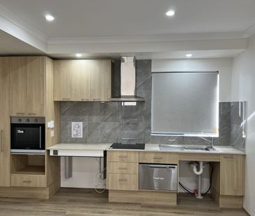 Low maintenance living - Photo 2