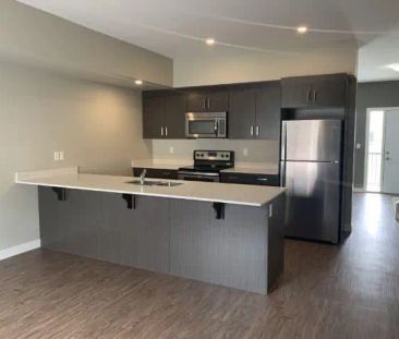 - 2 Bedroom at Liberty Park Townhomes &amp; Carriage Homes - Photo 4