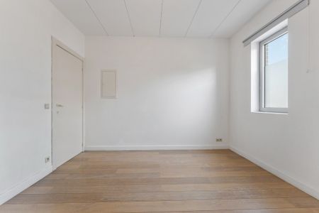 Gelijkvloers appartement met 1 à 2 slaapkamers, tuintje en garagebox - Photo 4