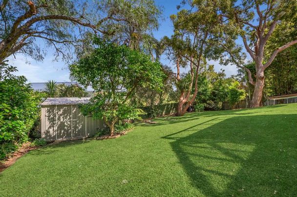 Peaceful Family Living with Space, Privacy & Entertaining Appeal - Photo 1