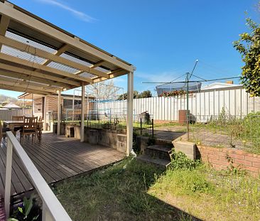 Solid three bedroom home with modern updates - Photo 6