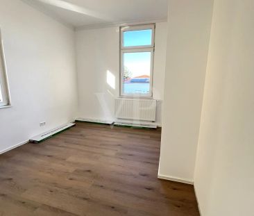 Hochwertige Mietwohnung im sanierten Altbau in zentraler Lage - Photo 2