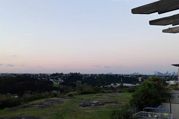 Renovated 3 Bedroom Townhouse with Scenic District Views - Photo 1