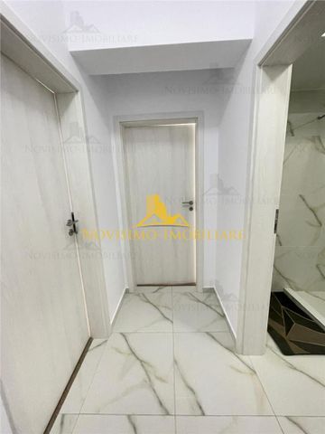 APARTAMENT DE INCHIRIAT CU DOUA CAM IN ZONA SEMICENTRALA de inchiriat - Fotografie 4