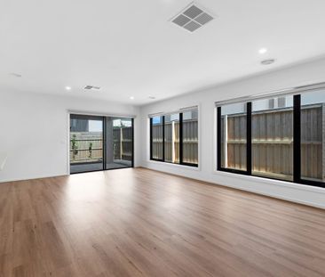 Quality Four-Bedroom Home with Low-Maintenance Living - Photo 1