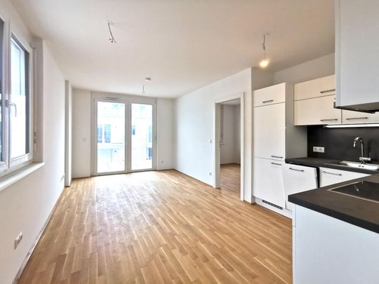 2-Zimmer-Wohnung mit Balkon, Fußbodenheizung und optionalem Garagenplatz - Photo 1