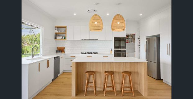 Elevated designer home with stunning coastal views - Photo 1