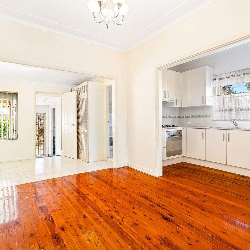 Charming Two Bedroom + Study Home with Flexible Living Options and Leafy Outlook - Photo 1