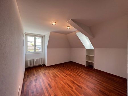Appartement mansardé de 3,5 pièces avec beaucoup de charme - Photo 3