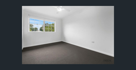 Light, Modern & Conveniently Located in Windsor - Photo 2