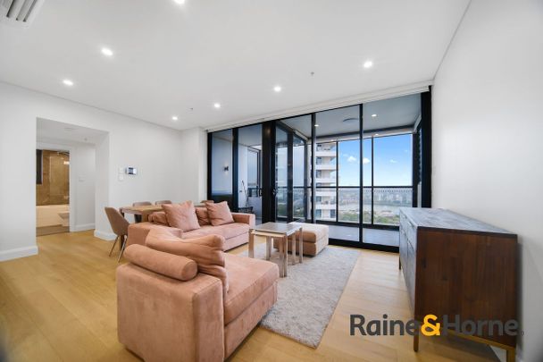 Stunning Fully Furnished Timber Floored 2 Bedroom with Water Views and Dual Balconies - Photo 1