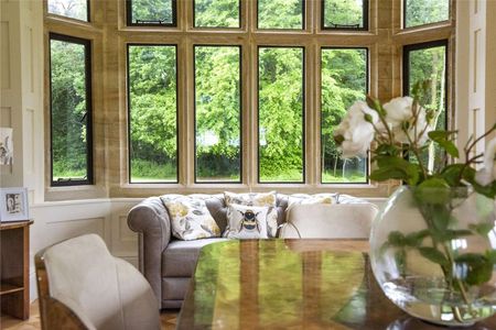 Beautifully refurbished family home of the highest quality, in an idyllic rural setting with far reaching views extensive secondary accommodation and about 14 acres. - Photo 4