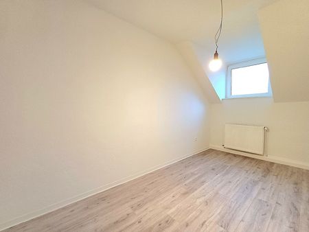 Dachgeschosswohnung in gepflegtem Wohnhaus - Photo 2