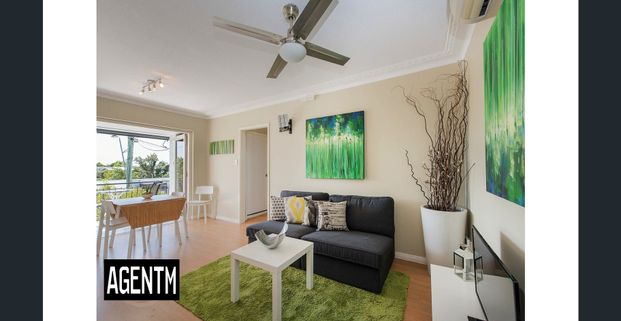 Cozy, Comfortable, Convenient - Top Floor Unit! - Photo 1