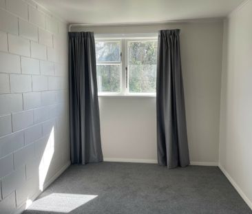 Tidy Unit Close to Town - Photo 1