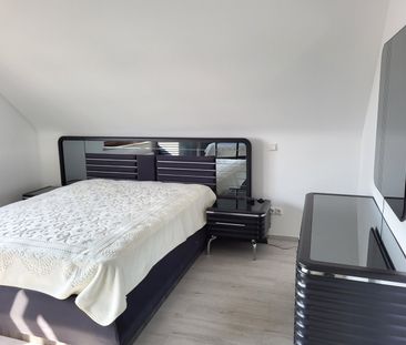 Neuwertige teilmöblierte Dachgeschosswohnung in Nentershausen mit Balkon! - Foto 1