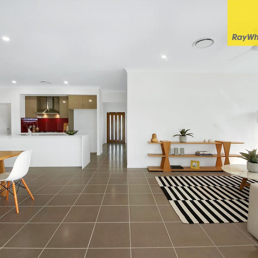 Comfort Meets Convenience - 4-Bedroom Family Home with Ducted A/C - Photo 1
