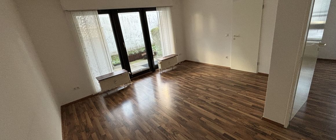 Gepflegte 2-Zimmer-Mietwohnung mit Terrasse und Garage - Foto 1