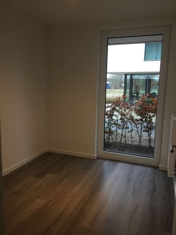 Gelijkvloers appartement met 2 slpk, terras en autostaanplaats - Foto 4