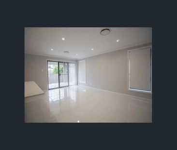 Spacious 4-Bedroom + Media Room House | No Stairs | 2-Remote-Contro... - Photo 1