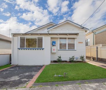Renovated Three Bedroom Home with Over-Sized Office - Photo 6