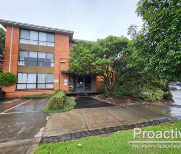 Stylish & Low-Maintenance Apartment Living in a Convenient Location - Photo 6