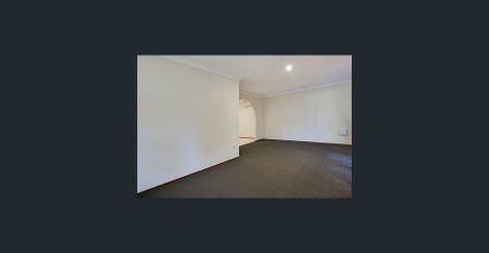 Comfortable Three-Bedroom Home in a Convenient Location - Photo 4