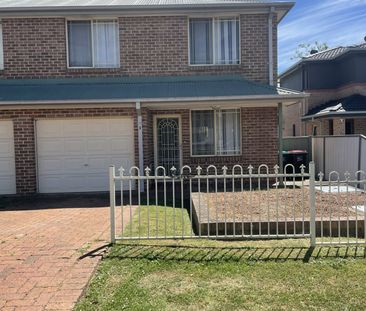 Spacious 3-Bedroom Townhouse in a Great Location - Photo 6