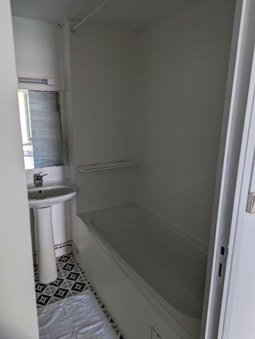 A LOUER VALENCIENNES APPARTEMENT MEUBLE 37 M2 AU RDC AVEC JARDIN QUARTIER ACACIAS - Photo 5