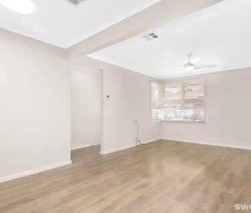 Conveniently positioned modern two bedroom unit with lock up garage - Photo 1