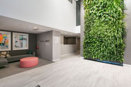 Stylish one bedroom unit plus a multi purpose room and secure car parking - Photo 4