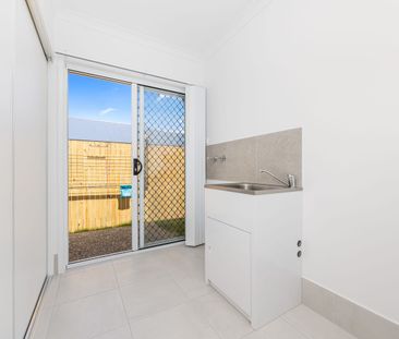 Near New Four-Bedroom Home with Ducted A/C & Media Room - Photo 5