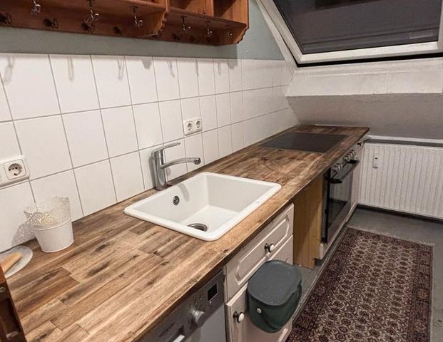 Gemütliche Dachgeschosswohnung - Foto 1