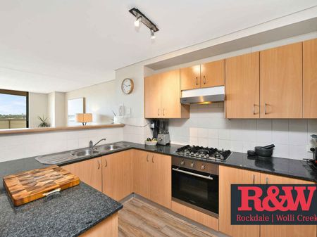 DEPOSIT TAKEN - Spacious Top-Floor Apartment with City Views & Resort-Style Amenities - Photo 2