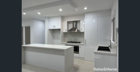 Modern Living in a Thriving Location! - Photo 4