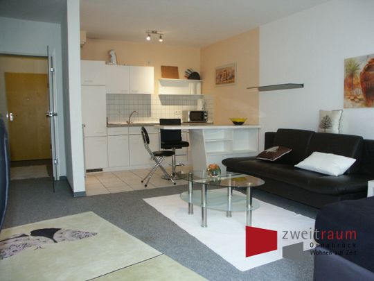 Schölerberg, helles und geschmackvoll eingerichtetes Halbsouterrain Apartment mit Küche und Bad. - Photo 1