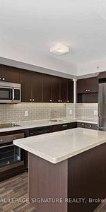 Station Condos! Sparkling clean 1 Bed + Den. European Style Kitchen - Photo 3