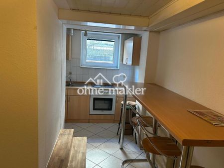 Schöne, helle 2-Zimmer Souterrainwohnung in Heusenstamm mit Einbauküche - Foto 3
