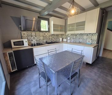 Maison mitoyenne d'un côté de 124,60 m² sur deux niveaux - Photo 6