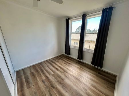 FRESHLY UPDATED HOME IN A FAMILY-FRIENDLY LOCATION - Photo 4