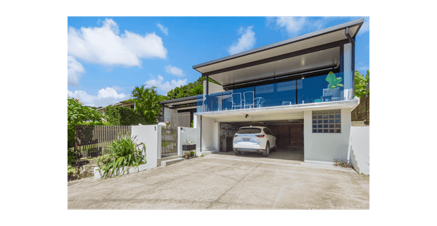 ELEVATED COASTAL HOME WITH WATER VIEWS - Photo 1