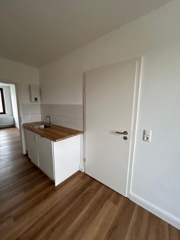 Gemütliche 2-Raumwohnung mit Einbauküche in Ottersleben - Foto 4